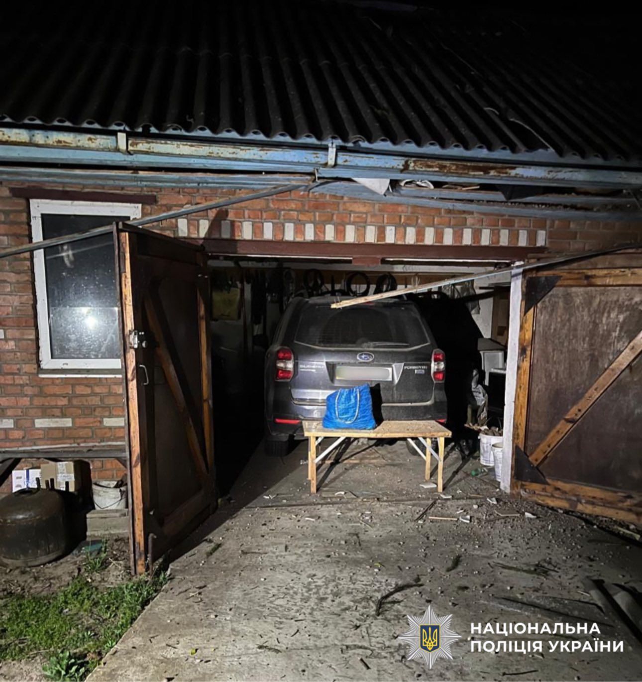 Пошкоджені вибухами гаражі Пошкоджені вибухами гаражі