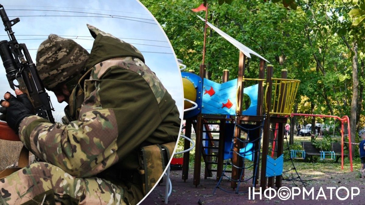 Військовий зі зброєю у дворі Харкова
