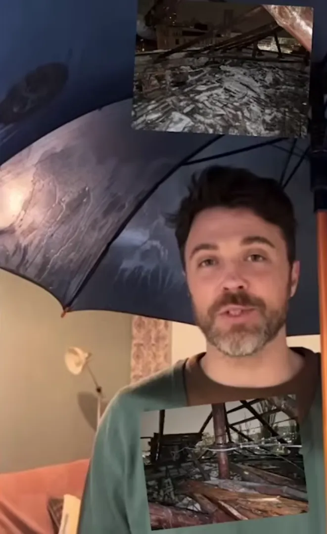 Коли заливало квартиру Попову довелося стояти під папасолкою