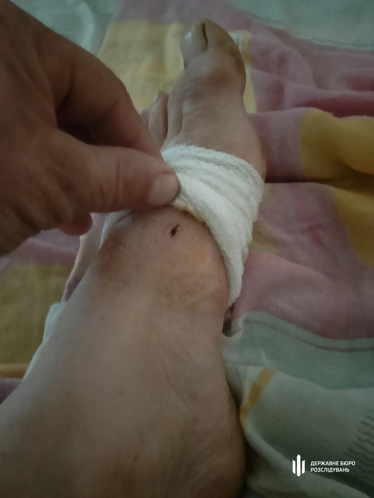 На фото - потерпілий від офіцера