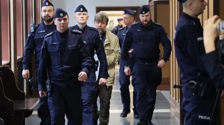 Олександр Бутягін прямує на засідання Окружного суду Варшави, фото - Тасс