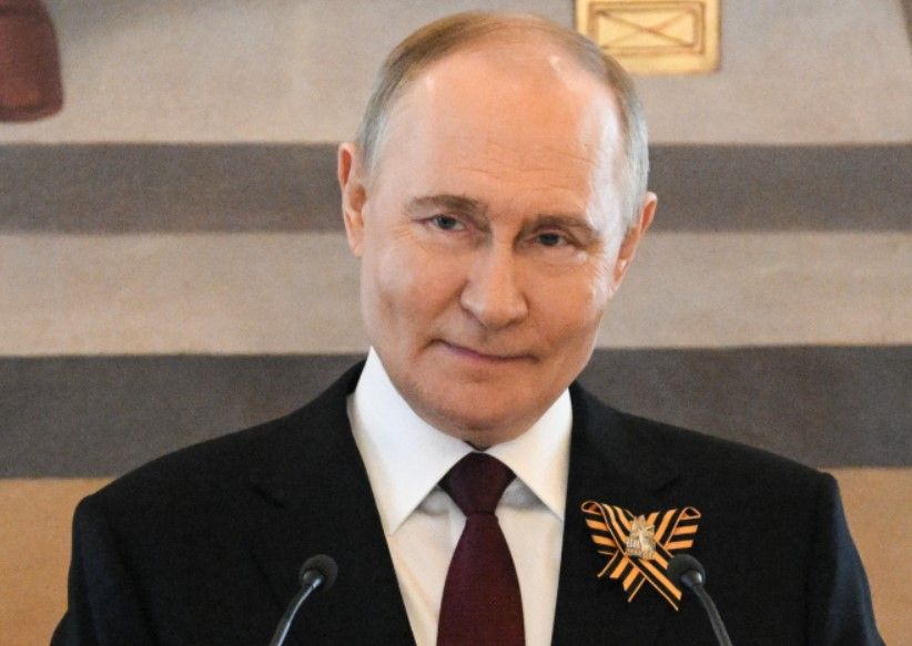 Путін