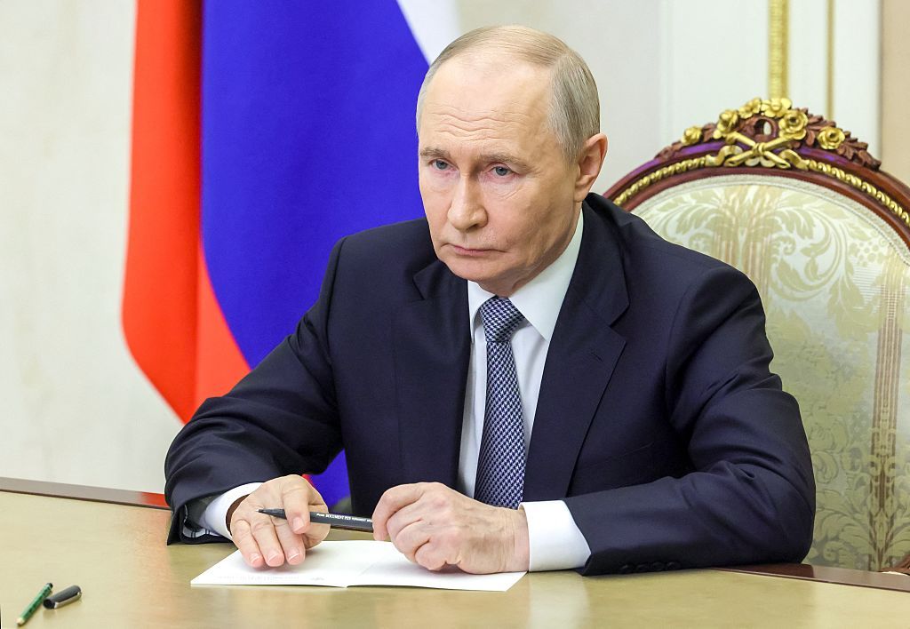 Путін
