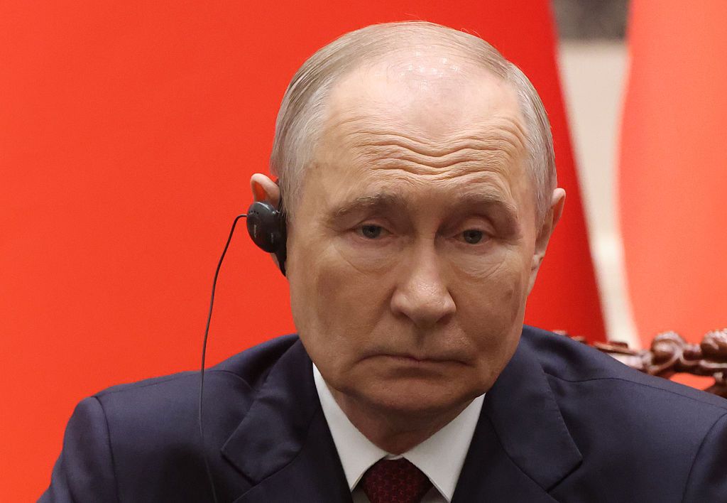 Путін