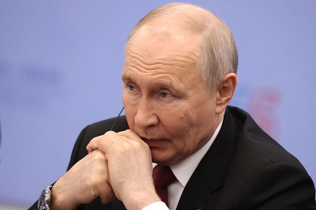 Путін