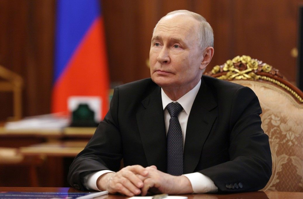 Путин