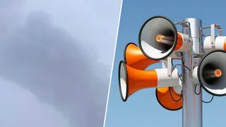 В городе прозвучал ряд взрывов, в небо поднялся столб дыма