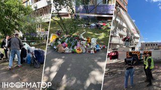 Кияни несуть до зруйнованого будинку на Дарниці квіти й іграшкових слоненят - репортаж