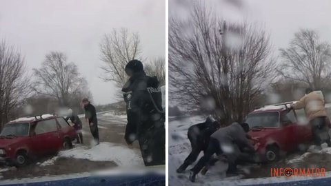 Машина застряла в яме на скользкой дороге: днепровские полицейские помогли водителю