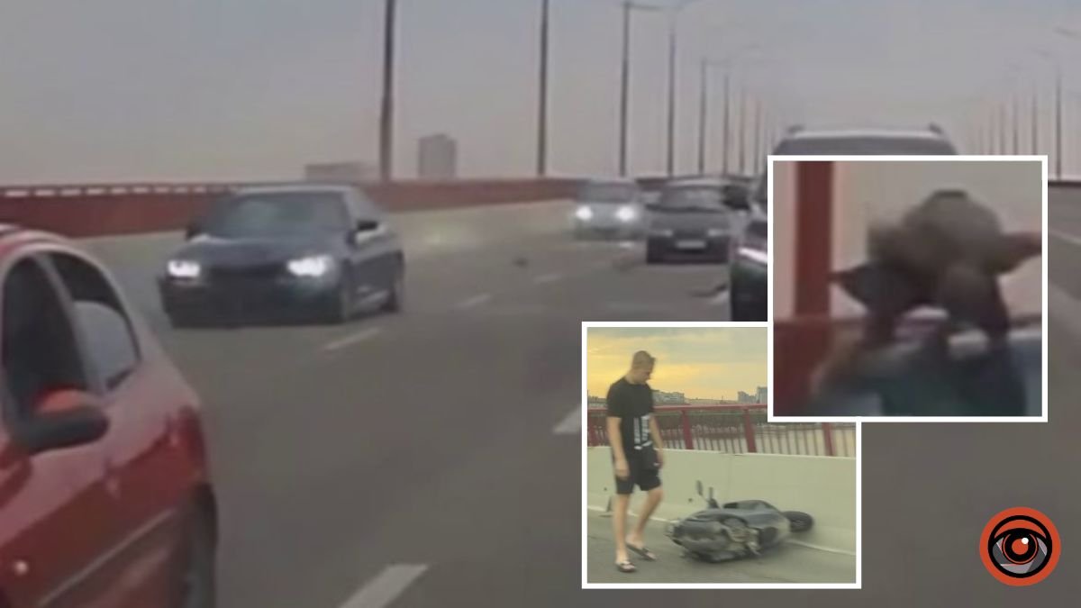 Видео момента ДТП: в Днепре на Новом мосту водитель BMW «покатал» скутериста на крыше и капоте