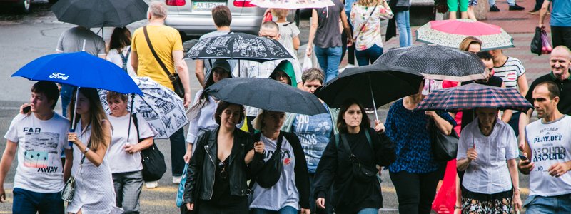 Столица в лицах: какое настроение у жителей Киева в дождливый выходной