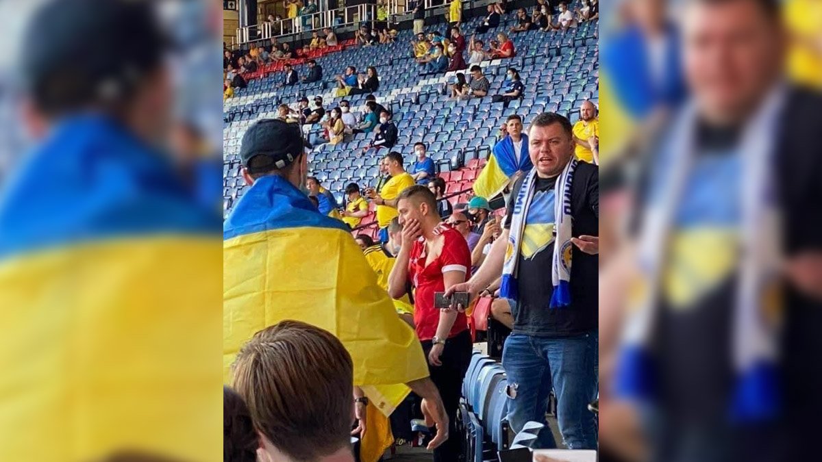 Футболку порвали, прапор відібрали: на матчі Україна — Швеція вболівальники побилися з фанатом у шапці-вушанці і з триколором