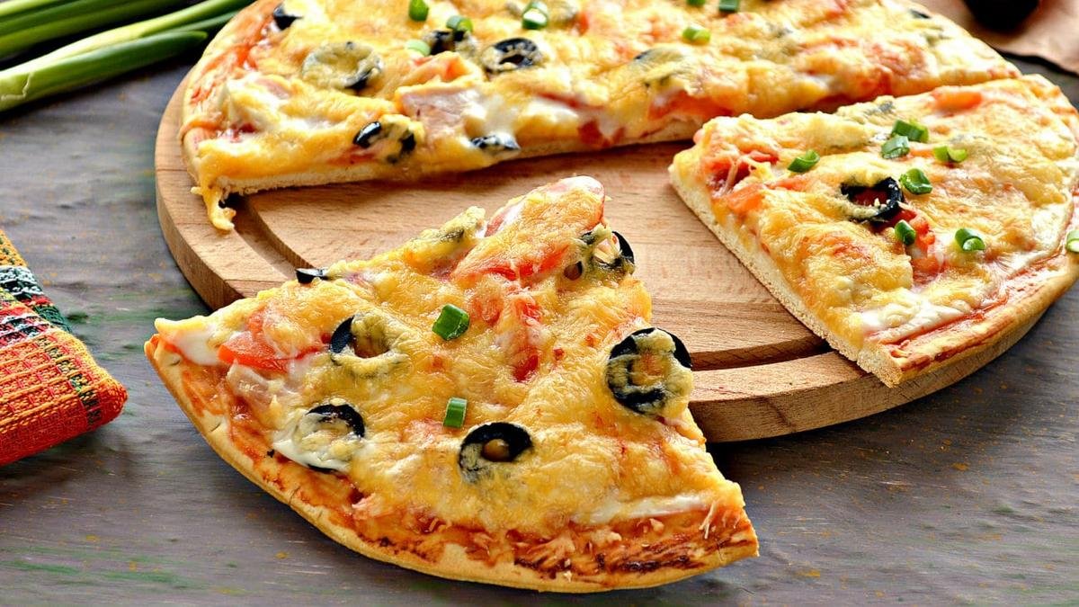 Простые и вкусные рецепты: как приготовить пиццу в домашних условиях